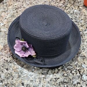 Elegant Black Hat with Purple Flower Accent